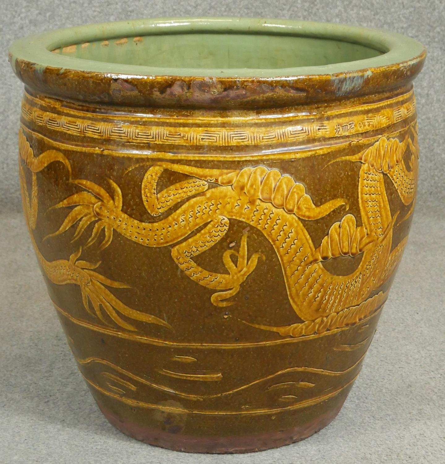 A pair of Chinese earthenware dragon glazed garden planters. H.47cm - Image 2 of 6