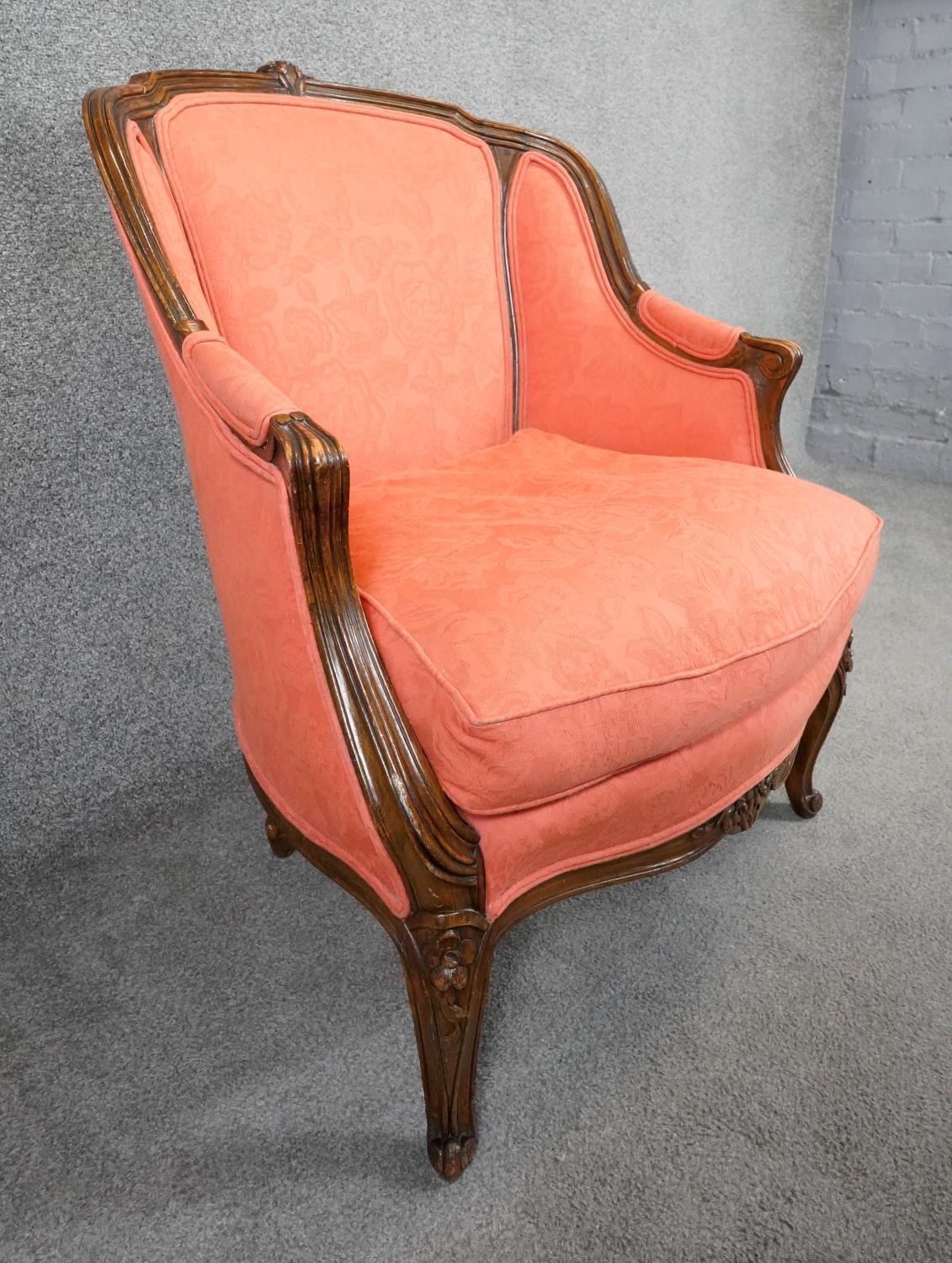 A Louis XV style carved walnut framed armchair in floral blush upholstery on cabriole supports. H. - Image 3 of 5