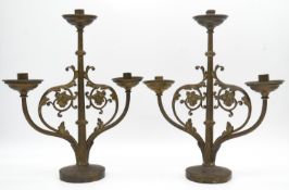 A pair of brass three branch table candelabras with scrolling foliate branches. H.38cm
