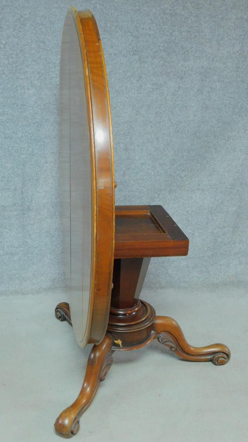 A Victorian mahogany tilt top dining table on tripod carved cabriole supports. H.68 W.122 D.122cm - Image 3 of 5