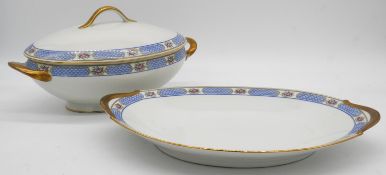 Two pieces of Reynaud Limoges porcelain. A large oval lidded soup tureen and a two handled serving