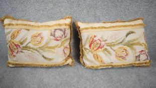 A pair of tapestry tulip design cushions with mustard fringing. Cream foliate design fabric to the