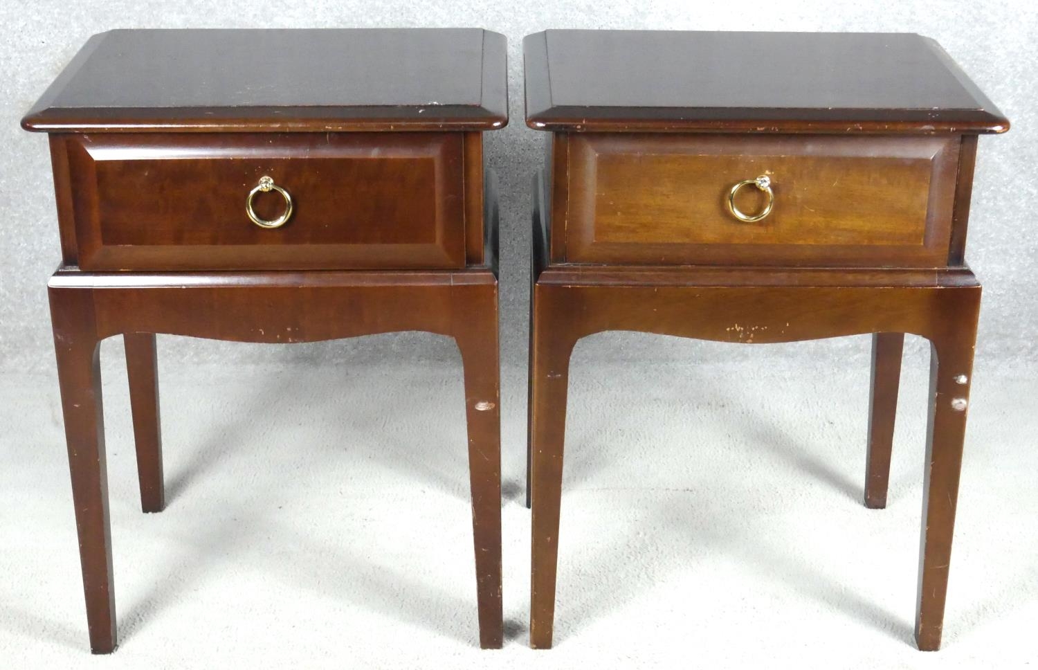 A pair of mahogany Stag furniture bedside cabinets. H.58cm