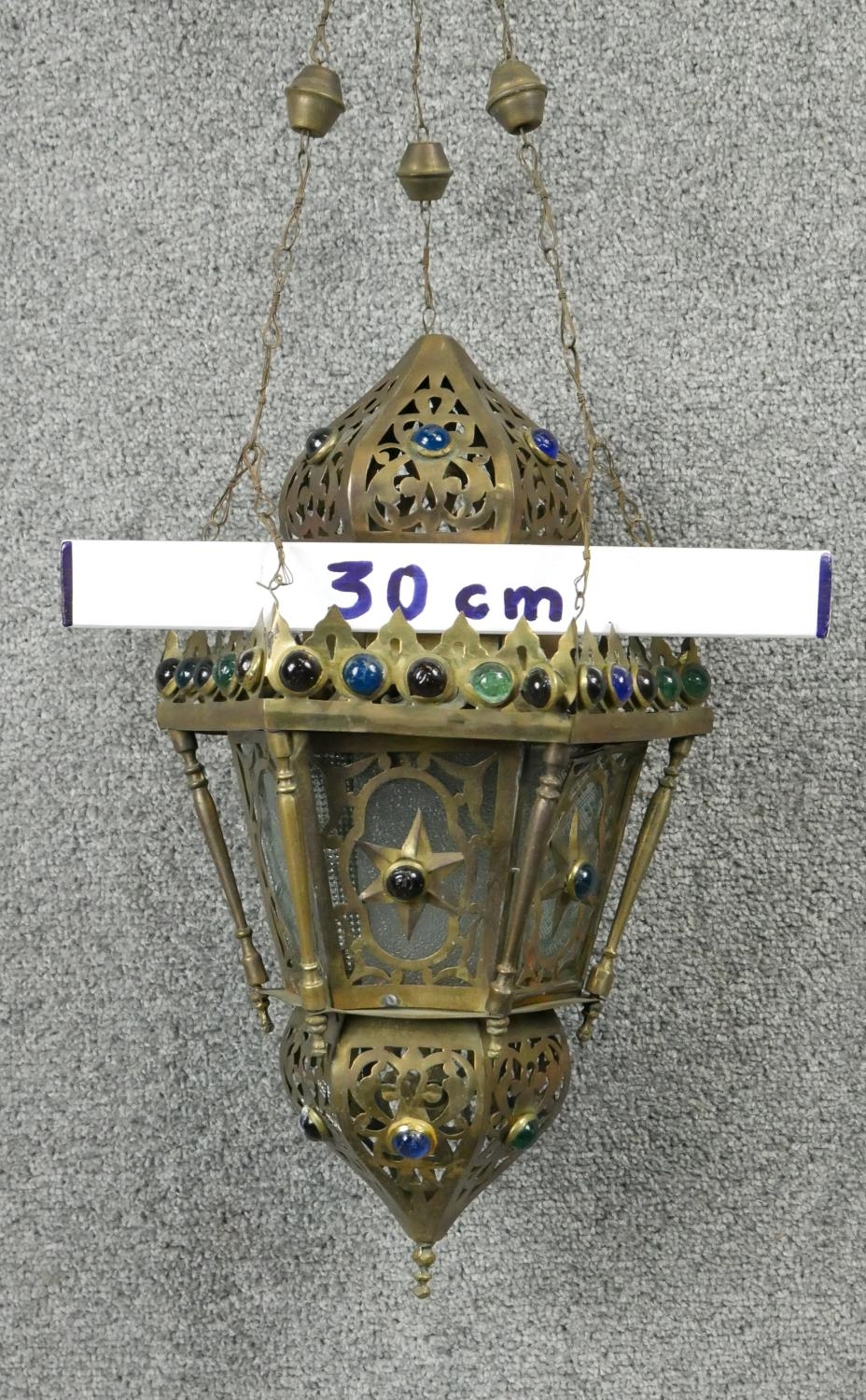 A pierced brass hanging lantern of North African influence. D.25cm - Image 4 of 4