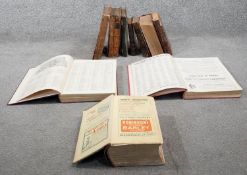 A collection of eleven antique leather bound books. including Mrs Beaton's Book of Household