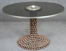 Anthony Redmile, a glass topped table with ivory and amethyst inlay to the top and cowrie shells