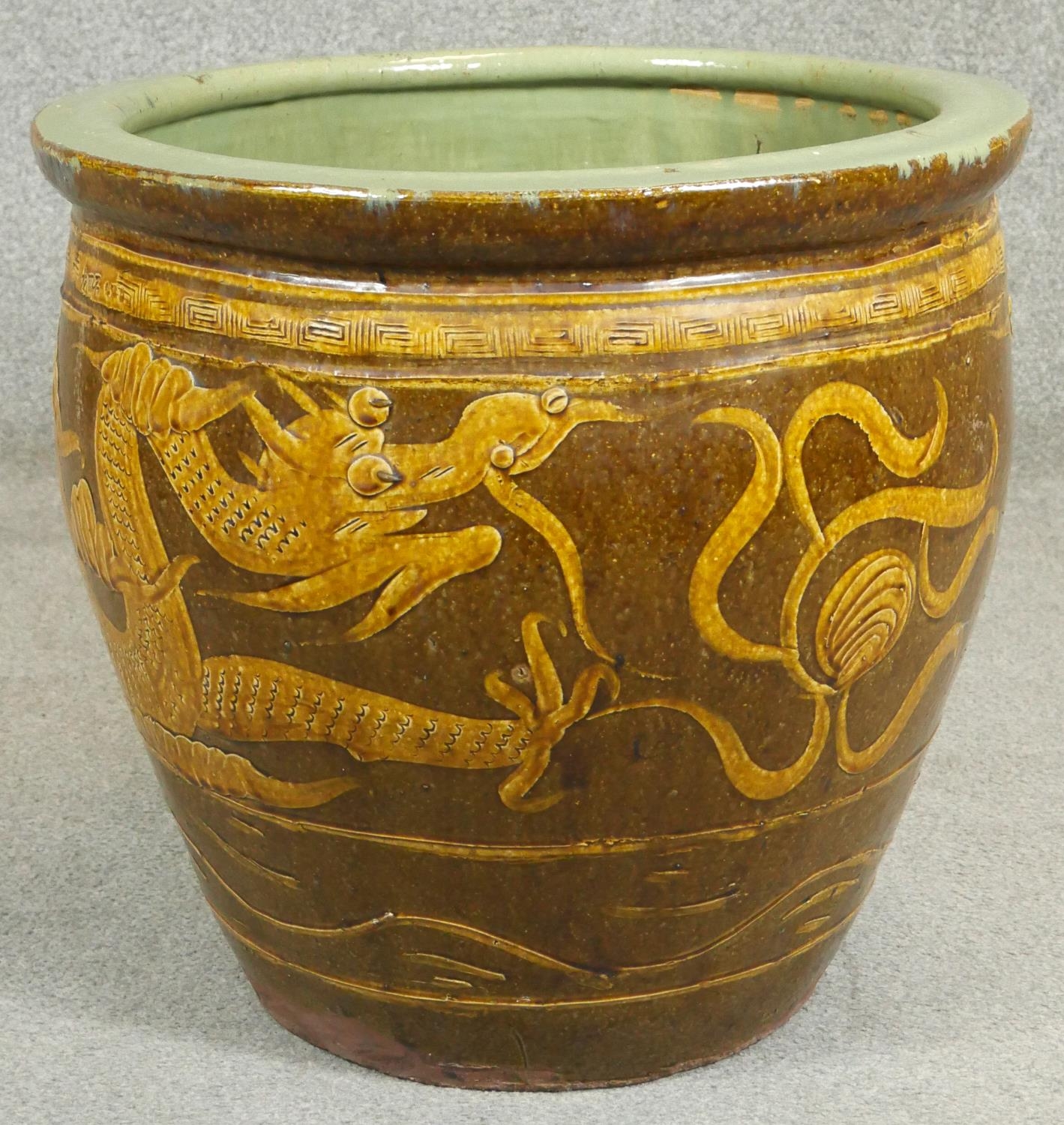 A pair of Chinese earthenware dragon glazed garden planters. H.47cm - Image 3 of 6