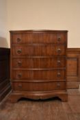 A Georgian style mahogany serpentine fronted chest of drawers on shaped bracket feet. H.99 W.77 D.