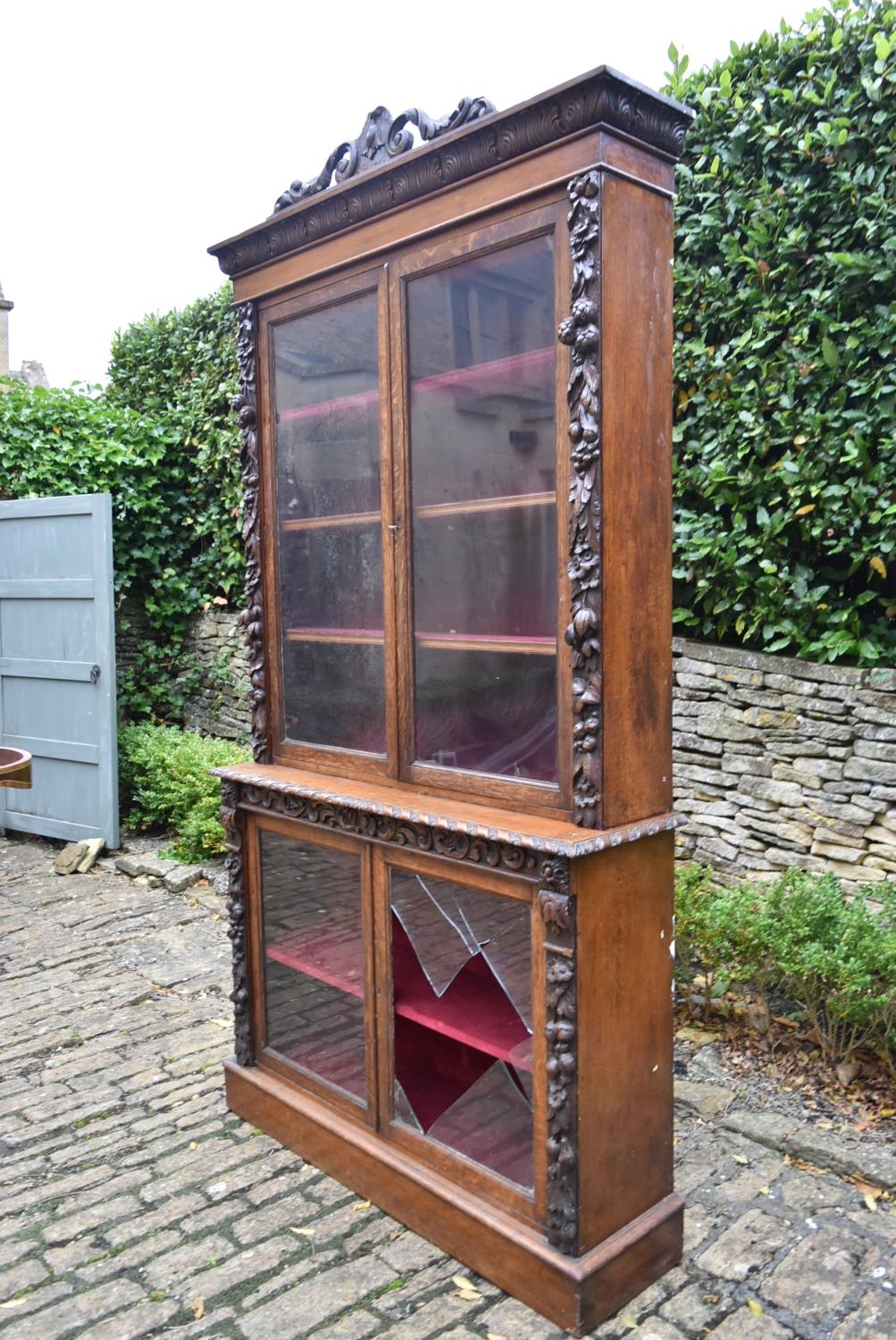 A mid 19th century oak two section library bookcase with glazed panel doors enclosing shelves - Image 3 of 15