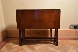 A late 19th century mahogany Arts and Crafts drop flap Sutherland table. H.57 W.69 D.64cm