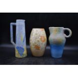 A collection of three vintage glazed and hand decorated vases. One by Radford with makers stamps