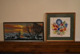 A framed and glazed tapestry, flowers along with another tapestry.