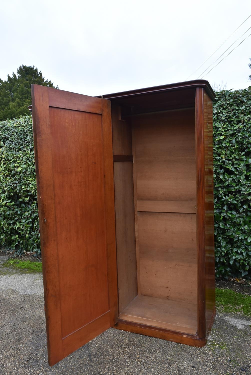 A 19th century flame mahogany two section wardrobe with panel doors enclosing full height hanging - Image 3 of 9