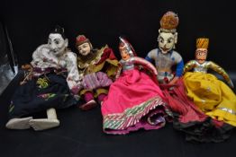 A collection of 20th century Indonesian dolls & puppets. H.60cm (largest doll) (5)