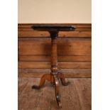 A 19th century oak chess table with slate, onyx and malachite inlaid top on tripod cabriole base.