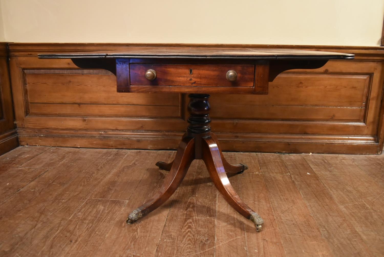 A Regency mahogany drop flap Pembroke table on quadruped swept supports terminating in brass lion' - Image 5 of 6