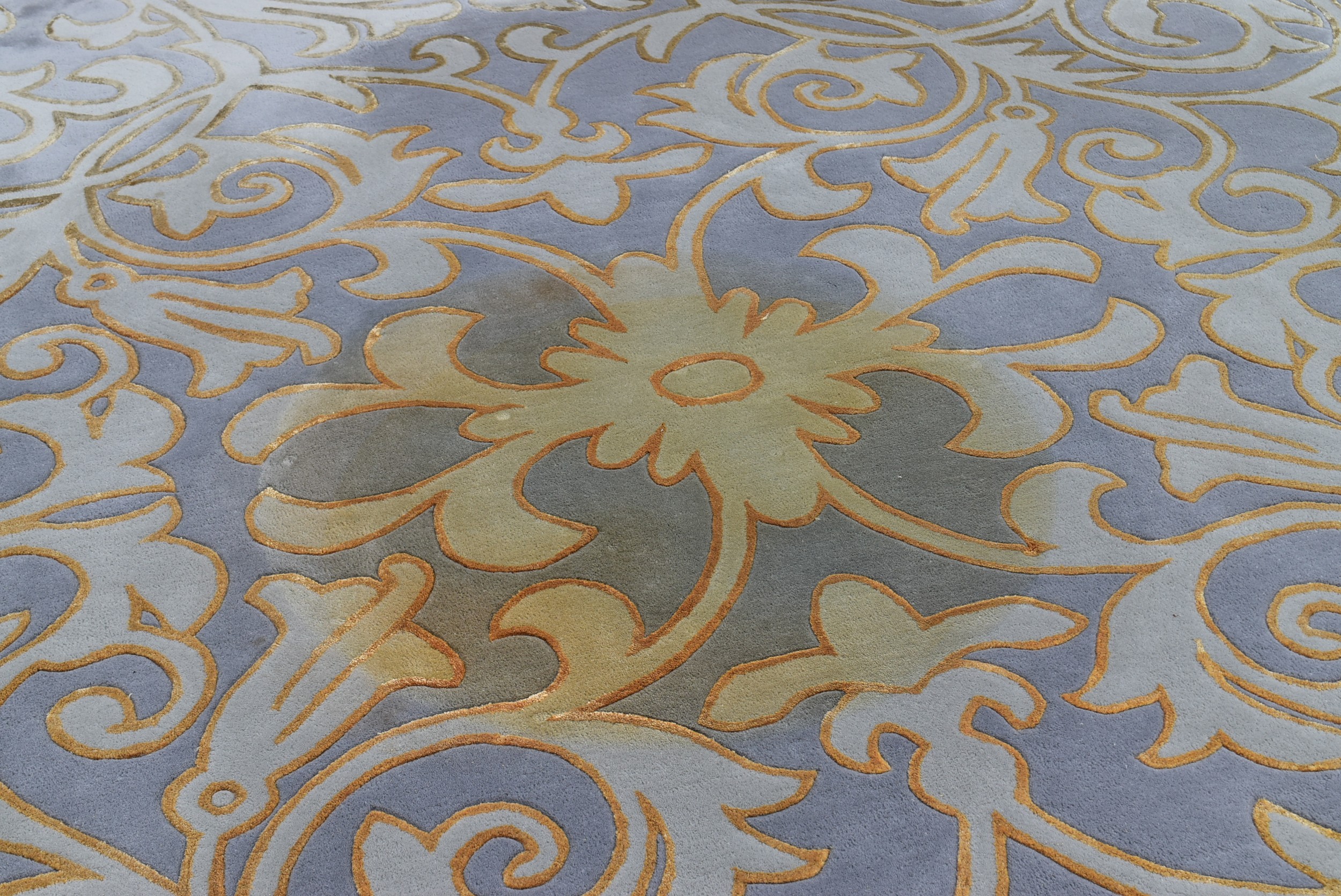 A large contemporary carpet with scrolling floral design on a powder blue ground. L.586 W.360cm ( - Image 5 of 5