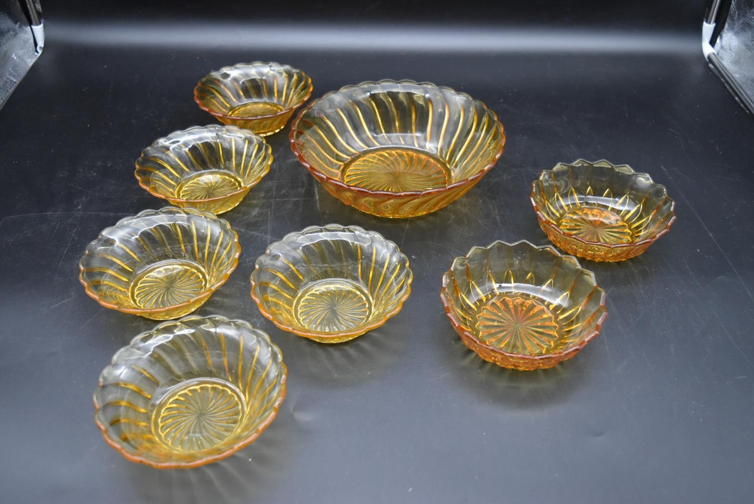 A set of seven vintage amber swirl depression glass fruit dessert bowls. H.7 Dia.20cm - Image 3 of 7