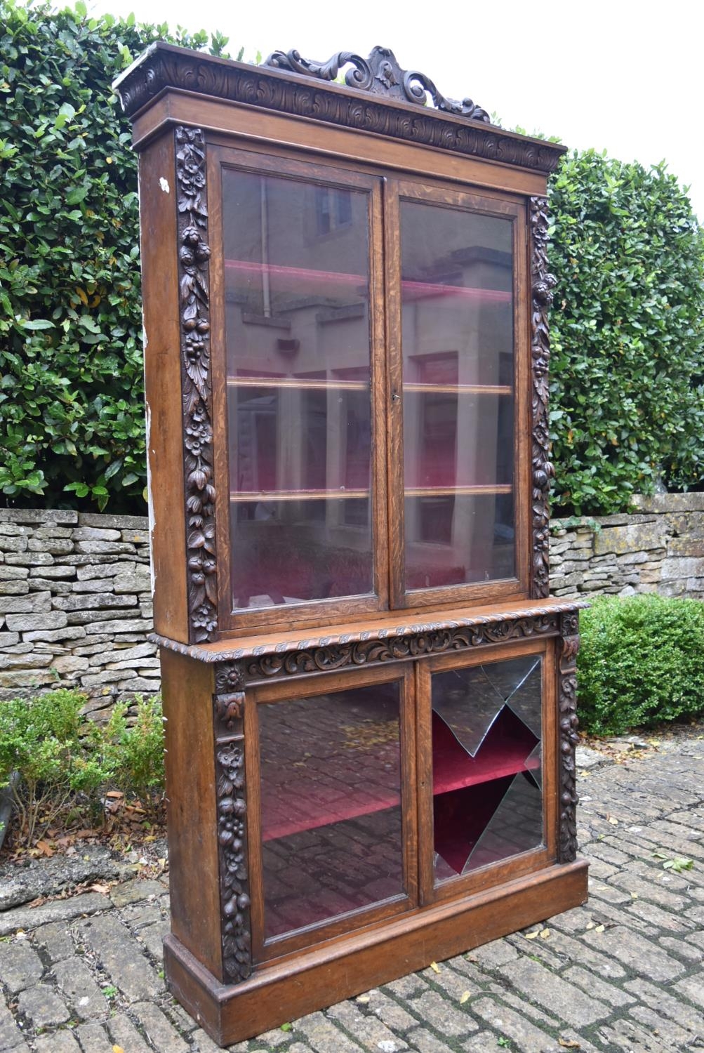 A mid 19th century oak two section library bookcase with glazed panel doors enclosing shelves - Image 2 of 15