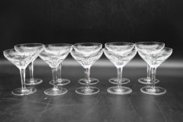 A set of ten crystal cut champagne coupes. H.14 Dia.10cm (10)