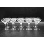 A set of ten crystal cut champagne coupes. H.14 Dia.10cm (10)