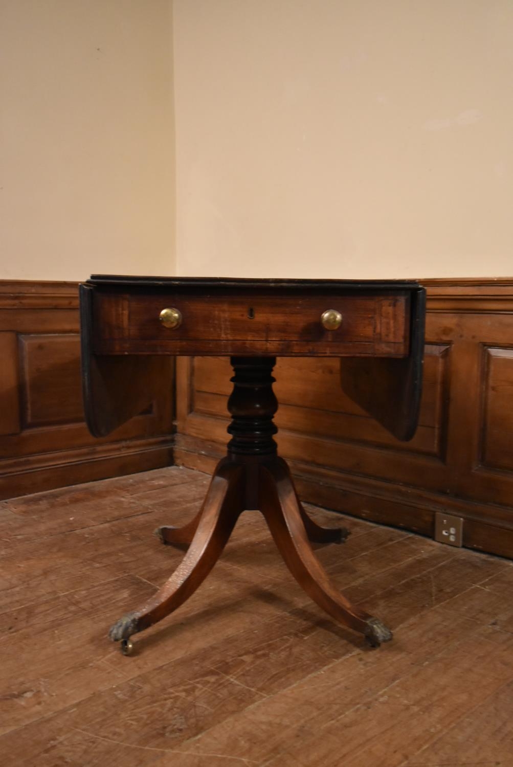 A Regency mahogany drop flap Pembroke table on quadruped swept supports terminating in brass lion' - Image 3 of 6