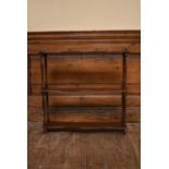 A set of 19th century mahogany wall shelves on turned supports. H.59 W.60 D.13cm