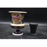 A 19th century campagna shape porcelain vase with hand painted floral decoration along with an