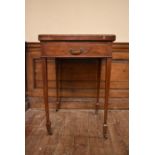 An Edwardian mahogany and satinwood inlaid swivel action envelope card table on slender square