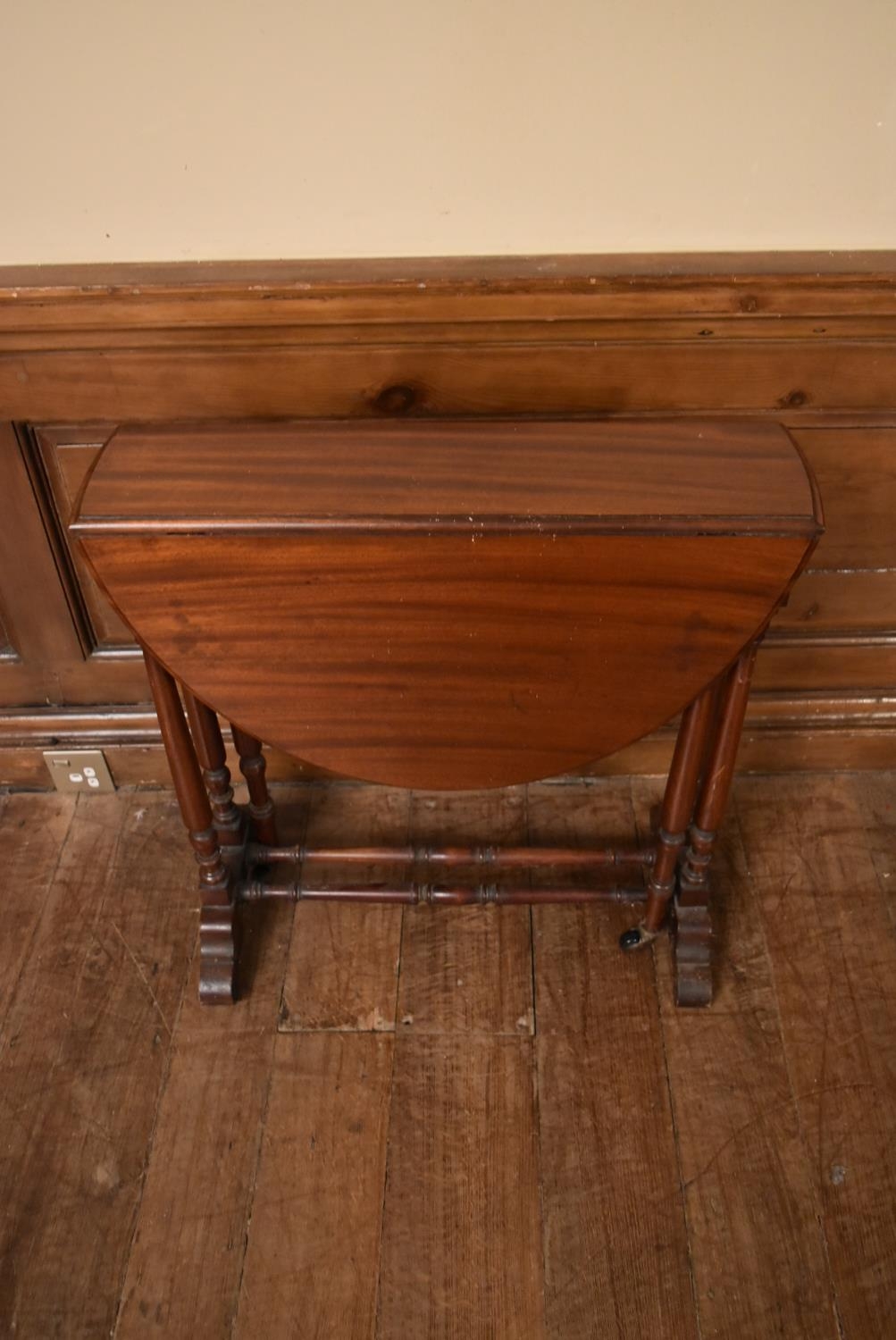 A 19th century mahogany drop flap Sutherland table on turned tapering supports. H.69 W.82 (extended) - Image 2 of 6