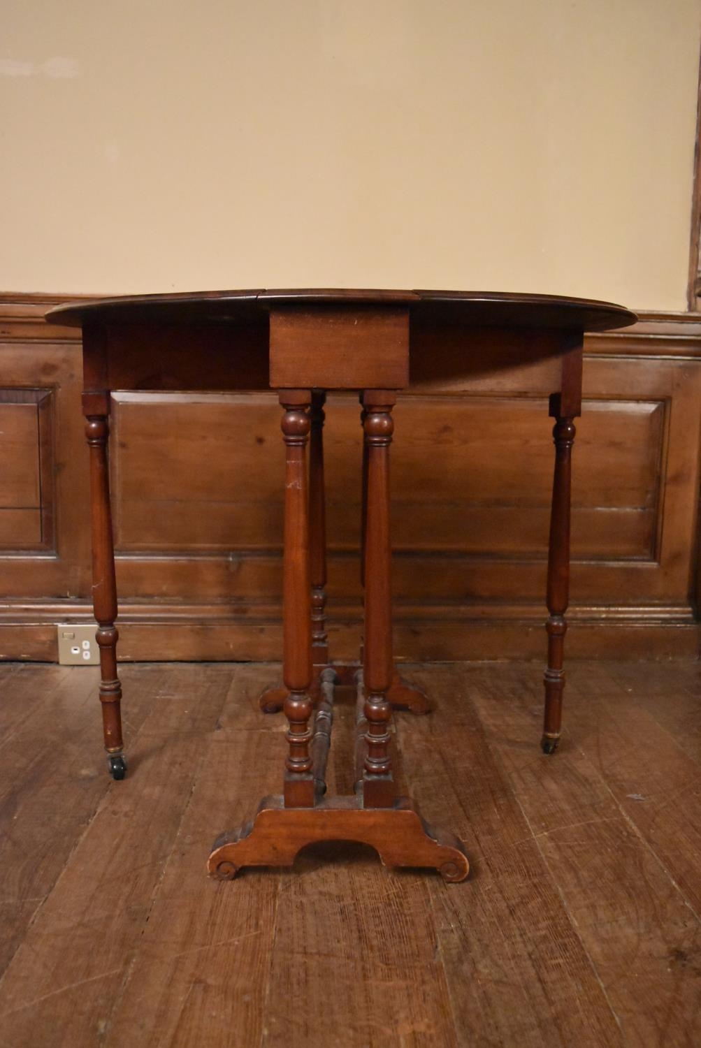 A 19th century mahogany drop flap Sutherland table on turned tapering supports. H.69 W.82 (extended) - Image 5 of 6
