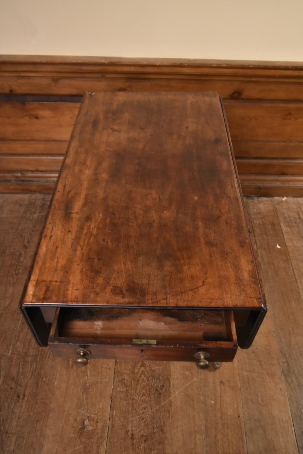 A Regency mahogany drop flap Pembroke table on quadruped swept supports terminating in brass lion' - Image 4 of 6