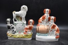 Two 19th century flatback Staffordshire groups, one a clock modelled with a white poodle standing on