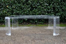 A vintage David Lange lucite and glass topped coffee table. H.39 W.120 D.72cm (a corner has split,
