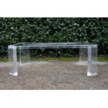 A vintage David Lange lucite and glass topped coffee table. H.39 W.120 D.72cm (a corner has split,
