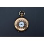 An Early 20th century 9ct gold half hunter lever pocket watch by Vertex, white enamel dial with