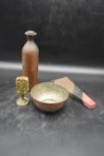 A copper flagon with screw top, a copper bowl, a brass match box holder and a pair of tailor's