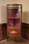 A 19th century French style ormolu mounted corner display cabinet with rosewood and kingwood