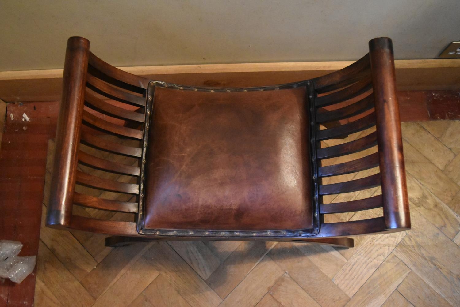 A mahogany X frame stool in leather upholstery. H.58 W.64 D.36cm - Image 2 of 5