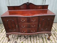 An early 20th century mahogany sideboard