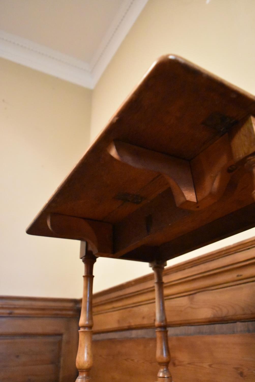 A late 19th century oak drop flap three tier buffet whatnot on turned supports terminating in - Image 7 of 10