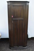 A Jacobean style oak hall cupboard.