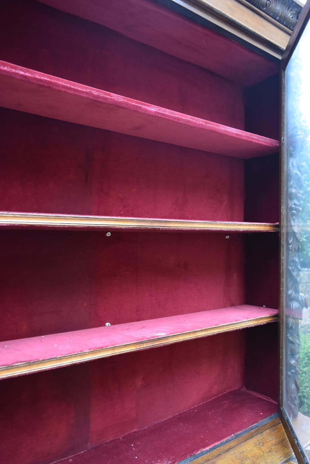 A mid 19th century oak two section library bookcase with glazed panel doors enclosing shelves - Image 9 of 15