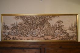 A large gilt framed Aubusson style wall hanging of a garden courting scene. H.75 W.204cm