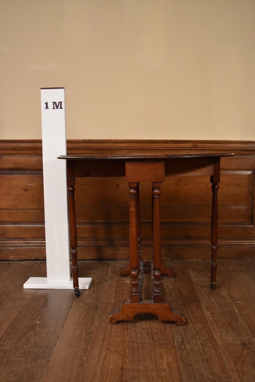 A 19th century mahogany drop flap Sutherland table on turned tapering supports. H.69 W.82 (extended) - Image 6 of 6