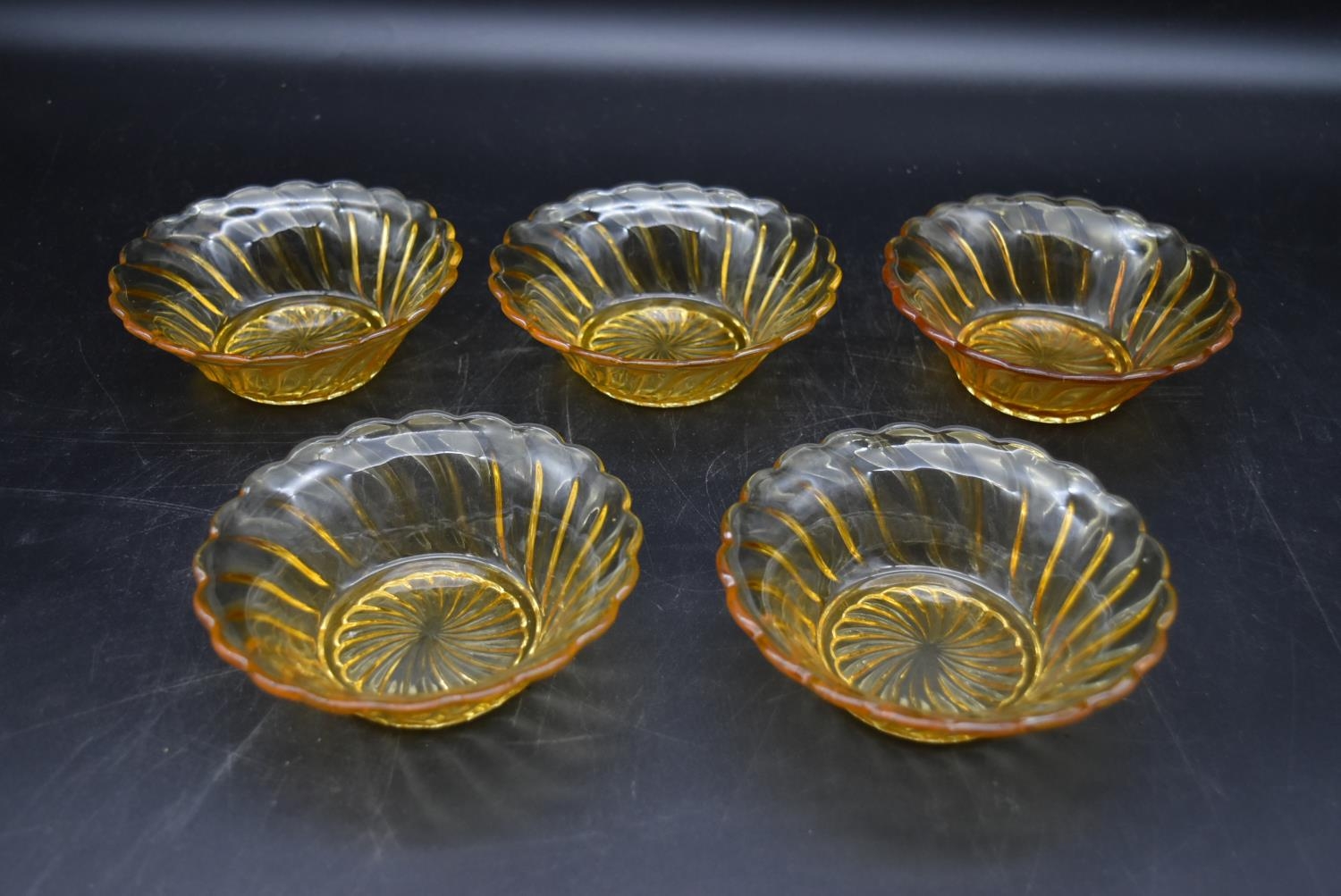 A set of seven vintage amber swirl depression glass fruit dessert bowls. H.7 Dia.20cm - Image 5 of 7