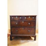 A Georgian mahogany chest of small size with all original brass work. H.78 W.80 D.50cm