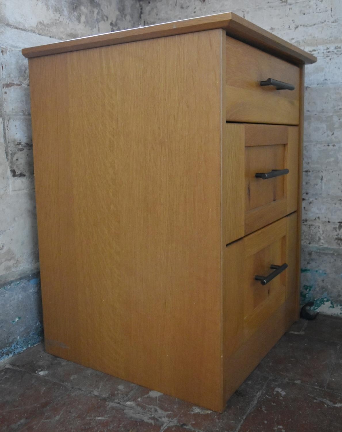A contemporary light oak three drawer filing cabinet. H.70 W.52 D.50cm - Image 4 of 5