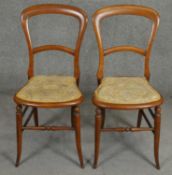 A pair of 19th century beech bedroom chairs. H.84cm