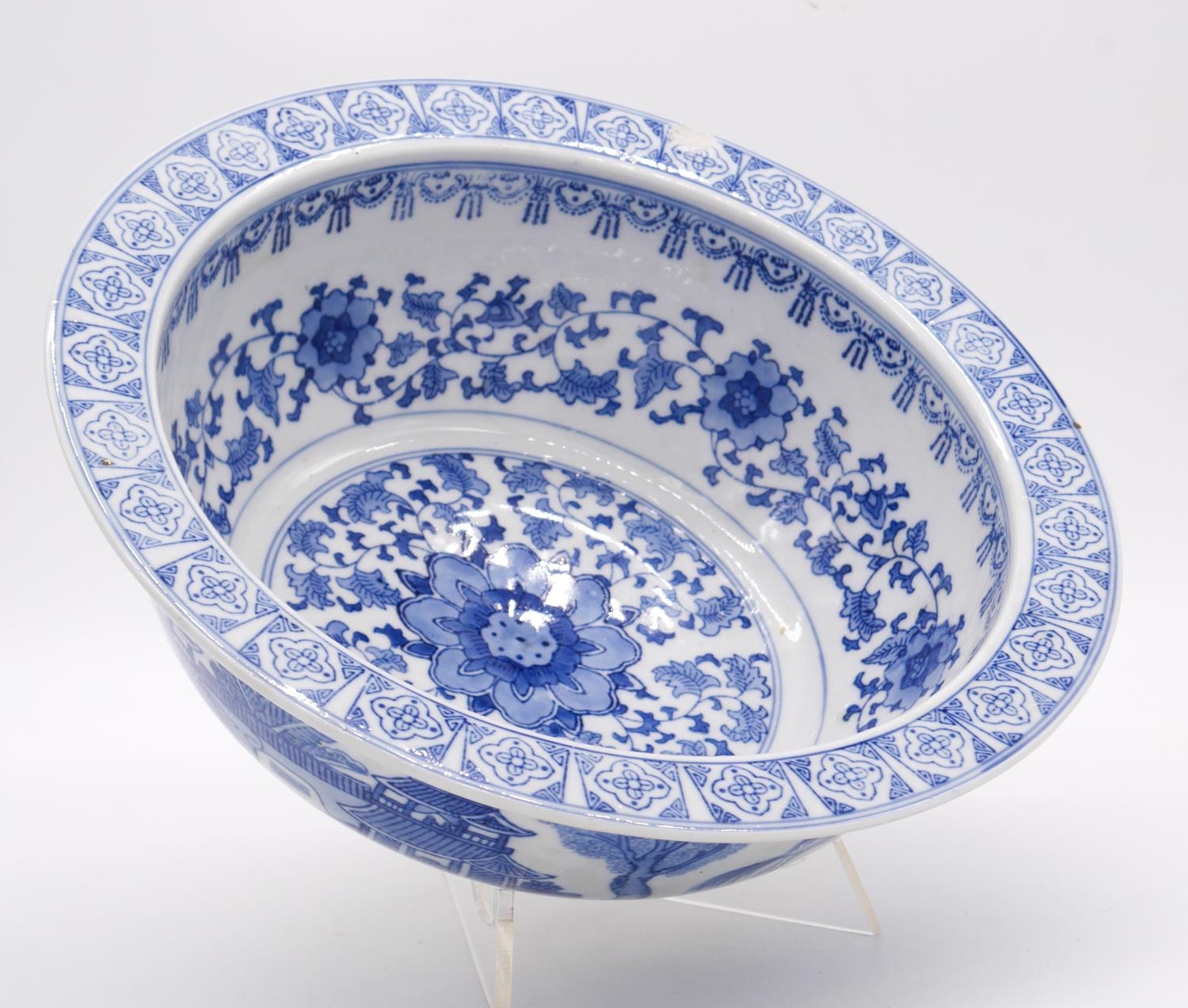 A blue and white Chinese porcelain glazed bowl with stylised floral and foliate design. D.34cm - Image 2 of 6
